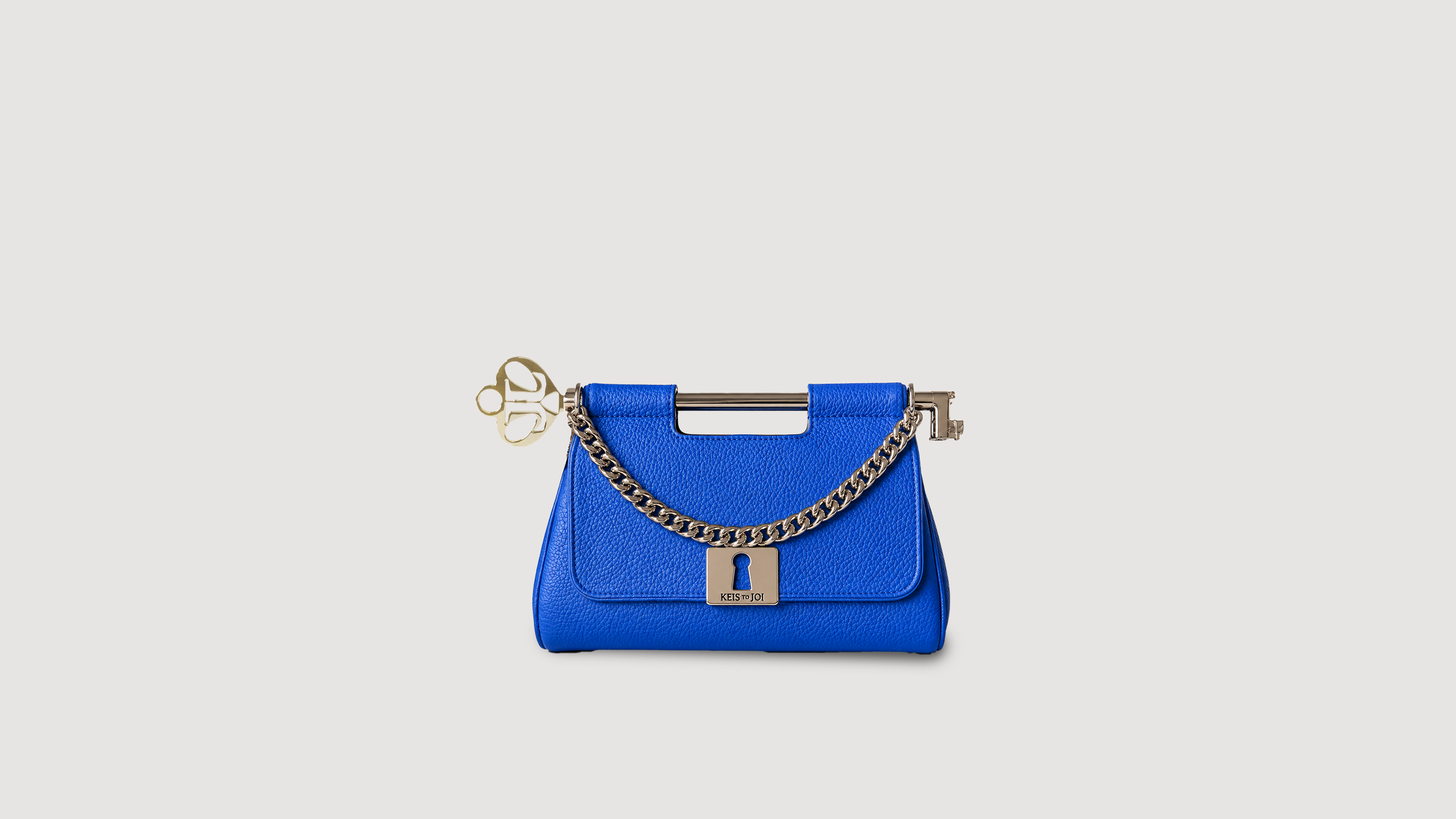 Legacy Clutch – Regal Blue Trevol cow